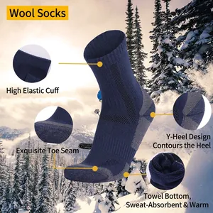 Thick merino wool hiking socks for men in navy blue, ideal for winter snow and skiing