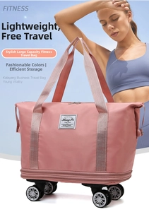 Detail of pink waterproof travel bag with double handles and rolling swivel wheels