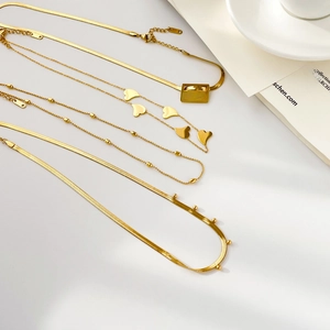 Minimalist gold snake chain and heart pendant necklaces set featuring FAITH letter charm