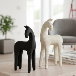 Modern minimalist resin horse statues in matte black and off-white for home decor