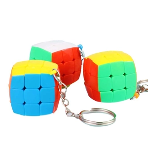 Mini 3x3 colorful smooth puzzle cube keychain with a silver metal link and ring