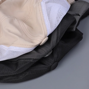 Detailansicht atmungsaktiver Mesh-Sonnenhüte mit verstärkten Nähten und Kopfknopf