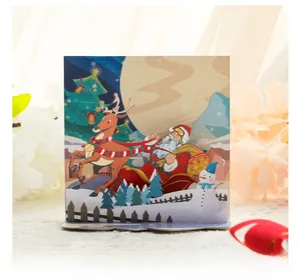 Detailed 3D pop-up Christmas card featuring Santa's sleigh over a snowy village scene