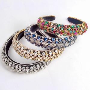 Baroque style wide headbands with crystals in silver, gold, and blue on white background