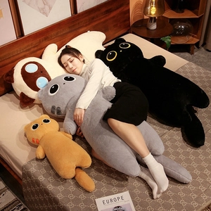 Woman holding long cat plush pillows in various colors for cozy home decoration