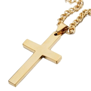 Polished gold stainless steel cross pendant necklace with a cuban chain on white background