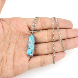 Handmade tree of life necklace with turquoise hexagonal crystal and silver wire wrap