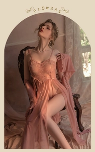 Detailed lace texture and sheer chiffon fabric of a romantic dusty pink nightgown and robe set