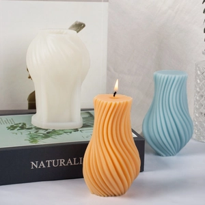 Geometric spiral silicone mold for scented candles featuring a 3D striped column design