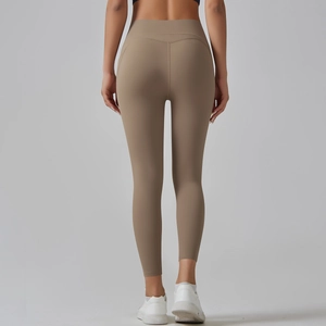 High-waisted khaki yoga leggings with seamless butt-lifting design for fitness
