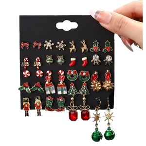 Lot de 20 paires de boucles d'oreilles de Noël avec flocons et rennes sur présentoir