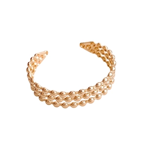 Three-layer beaded gold open ring with a minimalist stacked design and polished finish