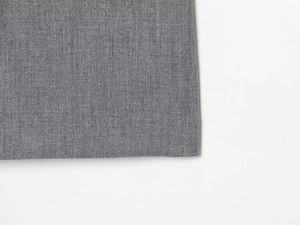 Detailed macro view of the grey satin fabric texture on this stylish mini dress