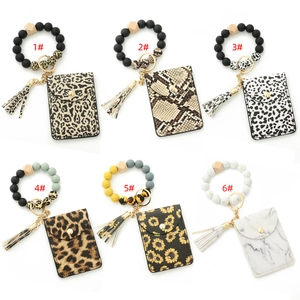 Silicone beaded bracelet keychain with floral card holder and tassel in 6 varied prints