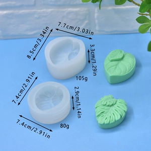 Monstera leaf silicone cake mold set with dimensions and green clay leaf models