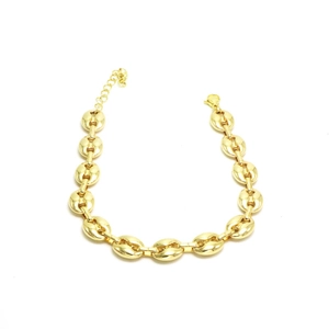 Macro detail of the golden coffee bean link chain with lobster clasp and extender