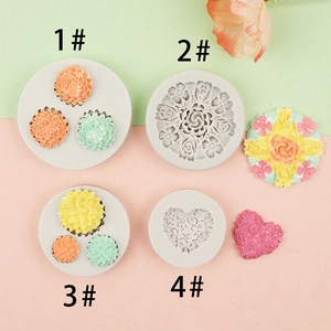 Detail of rose and mandala relief silicone molds for fondant and clay baking crafts