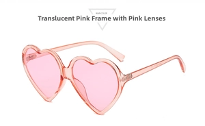 Detail of transparent pink heart-shaped sunglasses with metal hinges and matching lenses