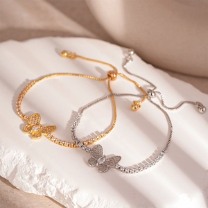 Elegant adjustable butterfly bracelet with pavé cubic zirconia in gold and silver finish