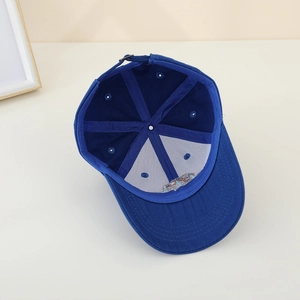 Internal view of navy blue kids baseball cap showing reinforced seams and cotton twill fabric