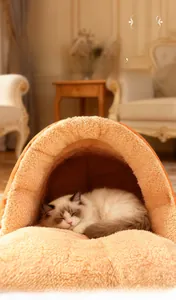 Detail of warm semi-enclosed cat cave with orange shell and soft plush velvet lining