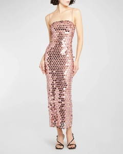 Detail of rose gold paillette sequins with fish scale pattern on long cocktail dress