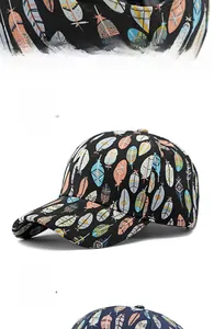 Detail showing adjustable metal buckle and colorful feather prints on baseball cap