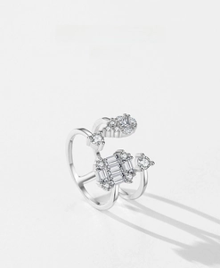 Macro detail of S925 sterling silver double layer ring with heart and round cubic zirconia