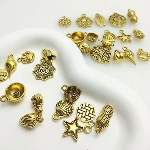 Ethnic vintage antique gold alloy peanut charms for DIY bracelet and jewelry making