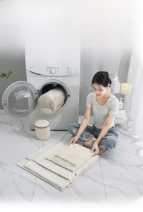 Detail of durable white honeycomb mesh laundry bags with zip protection for washing machine