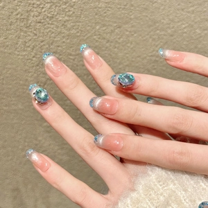 Pink to blue gradient press-on nails with luxury sea blue crystals and glitter