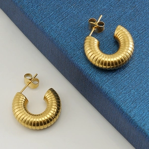 U-shaped solid gold twist earrings in stainless steel with polished spiral texture