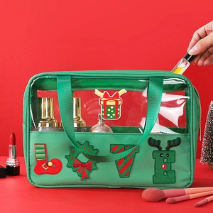 Detail of green Christmas chenille letter pouch being filled with toiletries