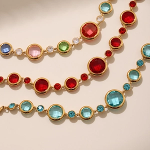 Colorful Czech glass bracelet with gold-plated bezels and multi-faceted round gemstones