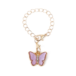 Golden chain accessory with a purple butterfly pendant featuring small sparkling rhinestones