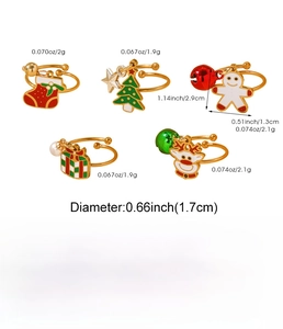 Close-up of five gold stainless steel Christmas rings with weight and size specifications