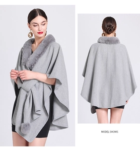 Front and back view of gray knitted poncho with plush faux fur collar and tassel ties