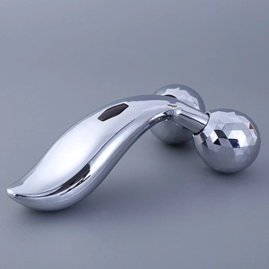 Detailed close-up of the silver 3D roller massager with multifaceted cutting heads