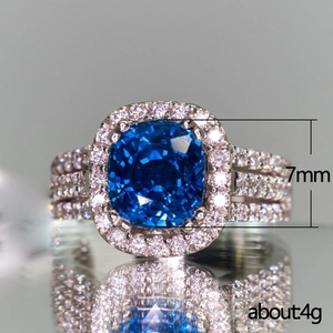 Luxurious cushion cut blue zircon halo ring in copper with triple row pave setting