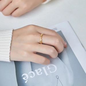 Stackable 18K gold plated honeycomb ring set featuring textured geometric disc pattern