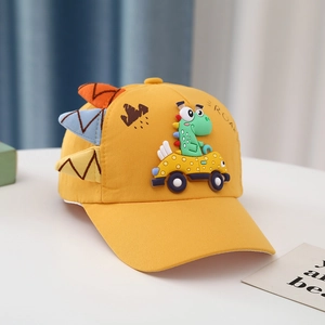 Close-up of ginger yellow kids baseball cap with 3D dinosaur car patch and roar text