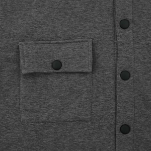 Detail view of American casual jacket with flap pocket and snap button closures