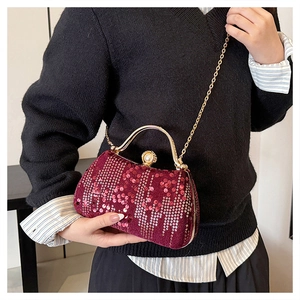 Elegant wine red sequin evening clutch bag with pearl handle and golden chain strap