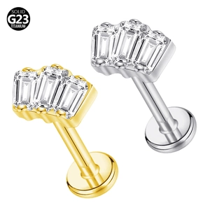 Pair of G23 titanium labret studs in gold and silver with baguette cut zircon inlay
