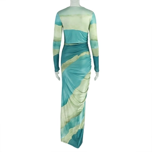 Detailed back view of a slim-fit long-sleeve dress with blue and green abstract print