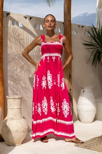 Detailed view of the square neck and smocked bodice on a bohemian floral maxi dress