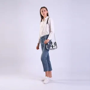 Transparent PVC saddle bag with black leather trim and silver chain shoulder strap for women