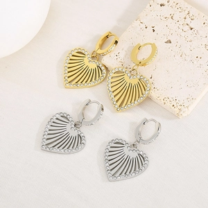 Elegant hollow heart earrings in gold and silver finish with sparkling zircon inlay