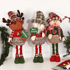 Three telescopic Christmas dolls: Reindeer, Santa, and Snowman with festive slogans