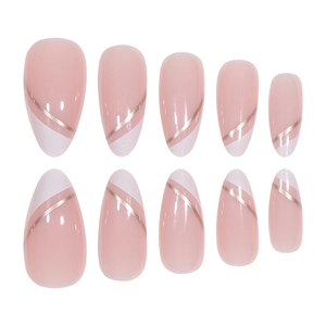 Almond shape press-on nails with nude pink, white tips, and elegant gold lines